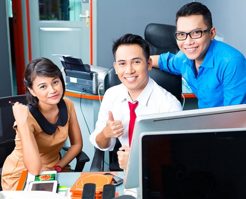 a team of consultant working in the office | Tech Support